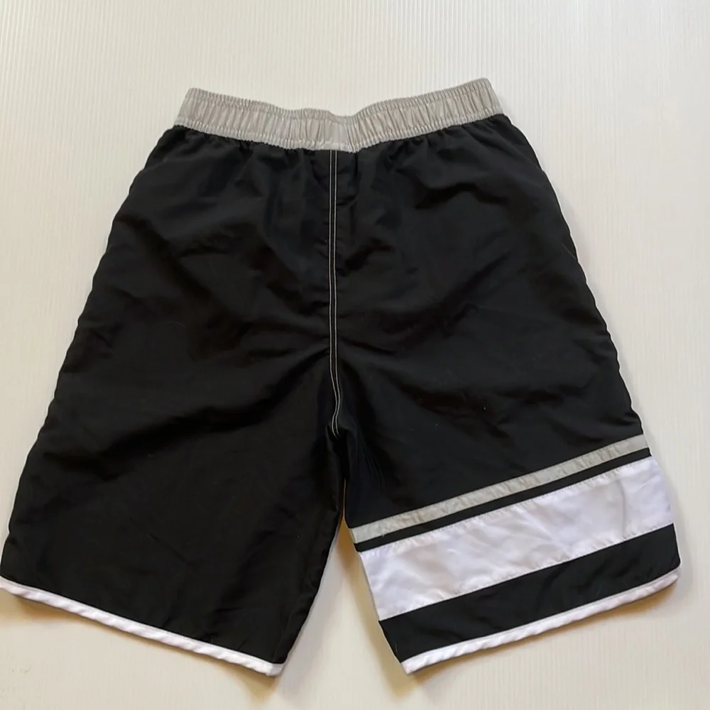 NFL Oakland Raiders black & white board short, swim trunk.  Boys large 14-16